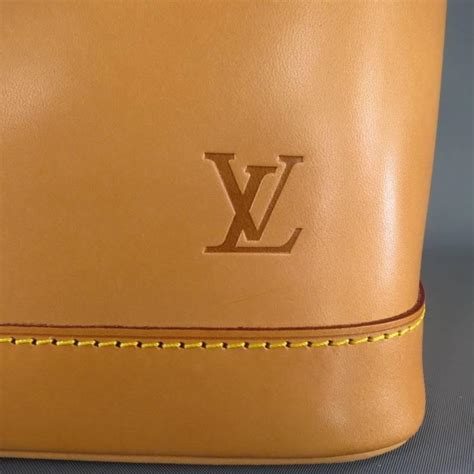 lv patina leather|louis vuitton patina handles.